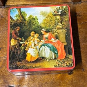 Vintage made in England large tin featuring the painting “Garden Idyll”